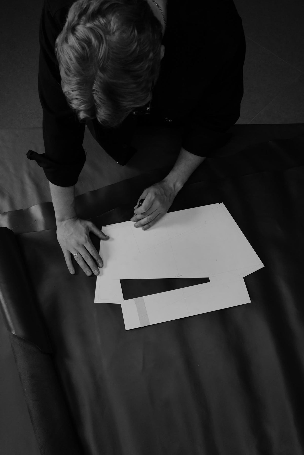 Marking a paper pattern by hand