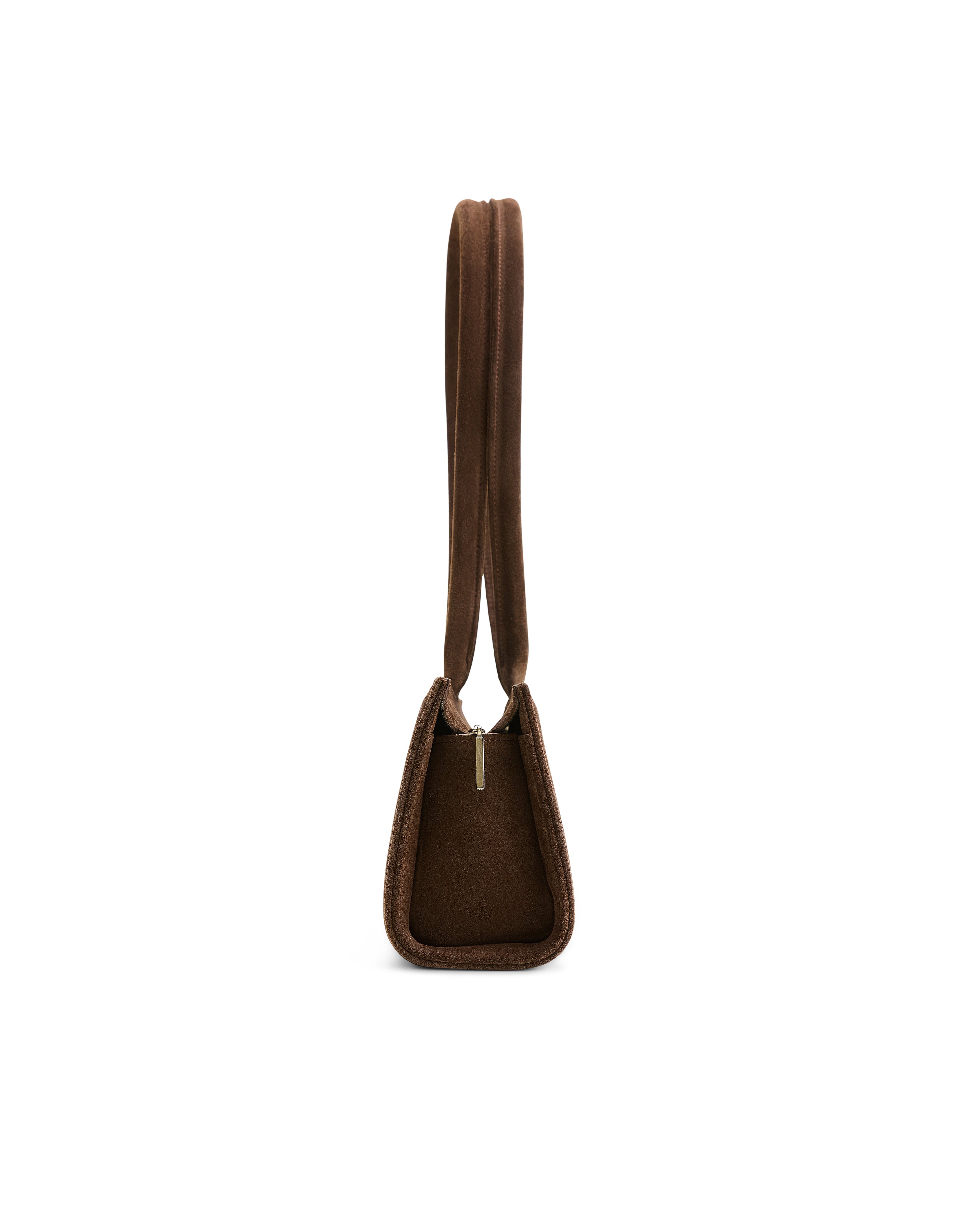 Side view of Poelle Atelier east-west vertical leather suede bag in brown with zipper closure