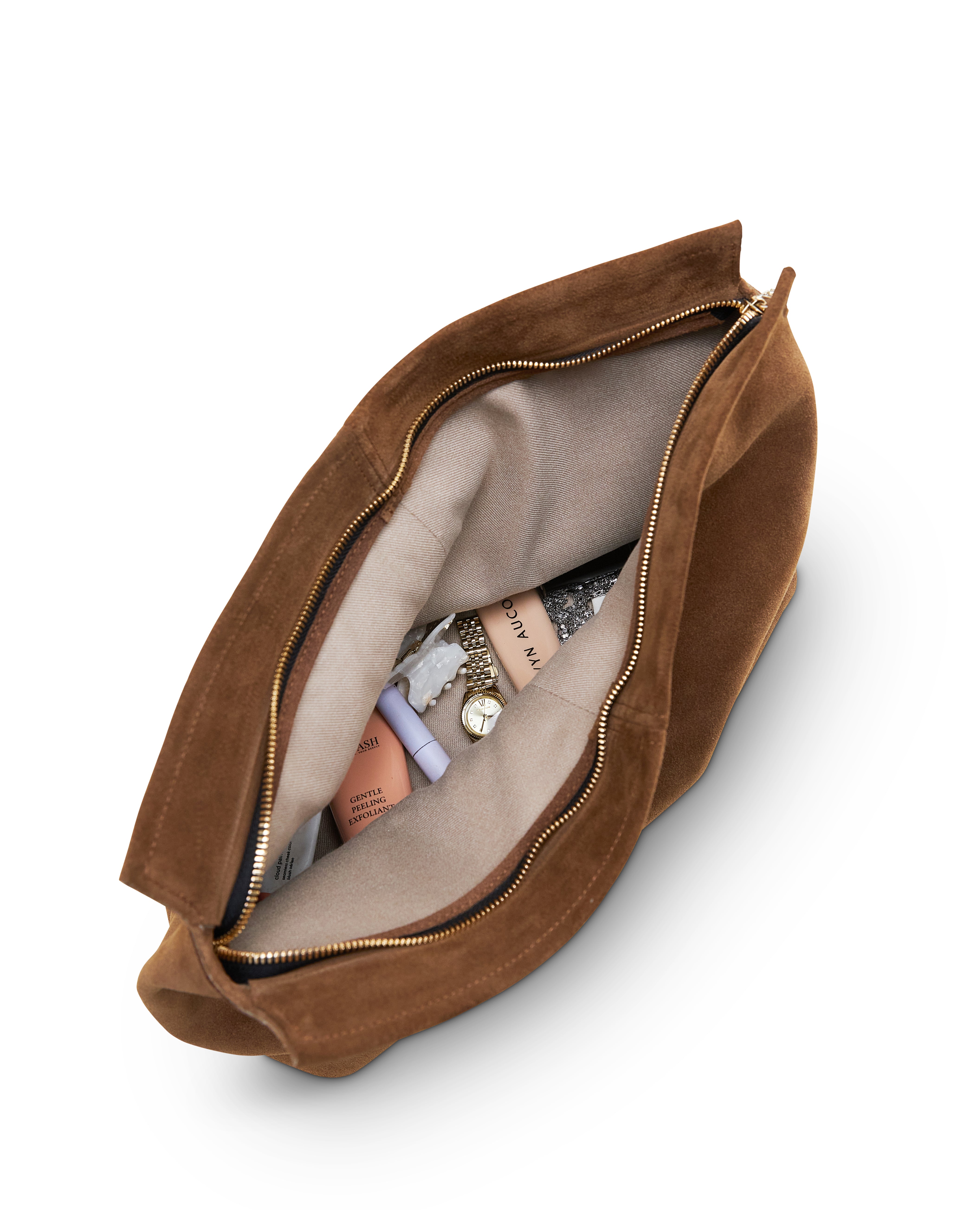 Poelle Atelier luxury suede clutch bag in brown with beige interior and gold zipper open showing contents