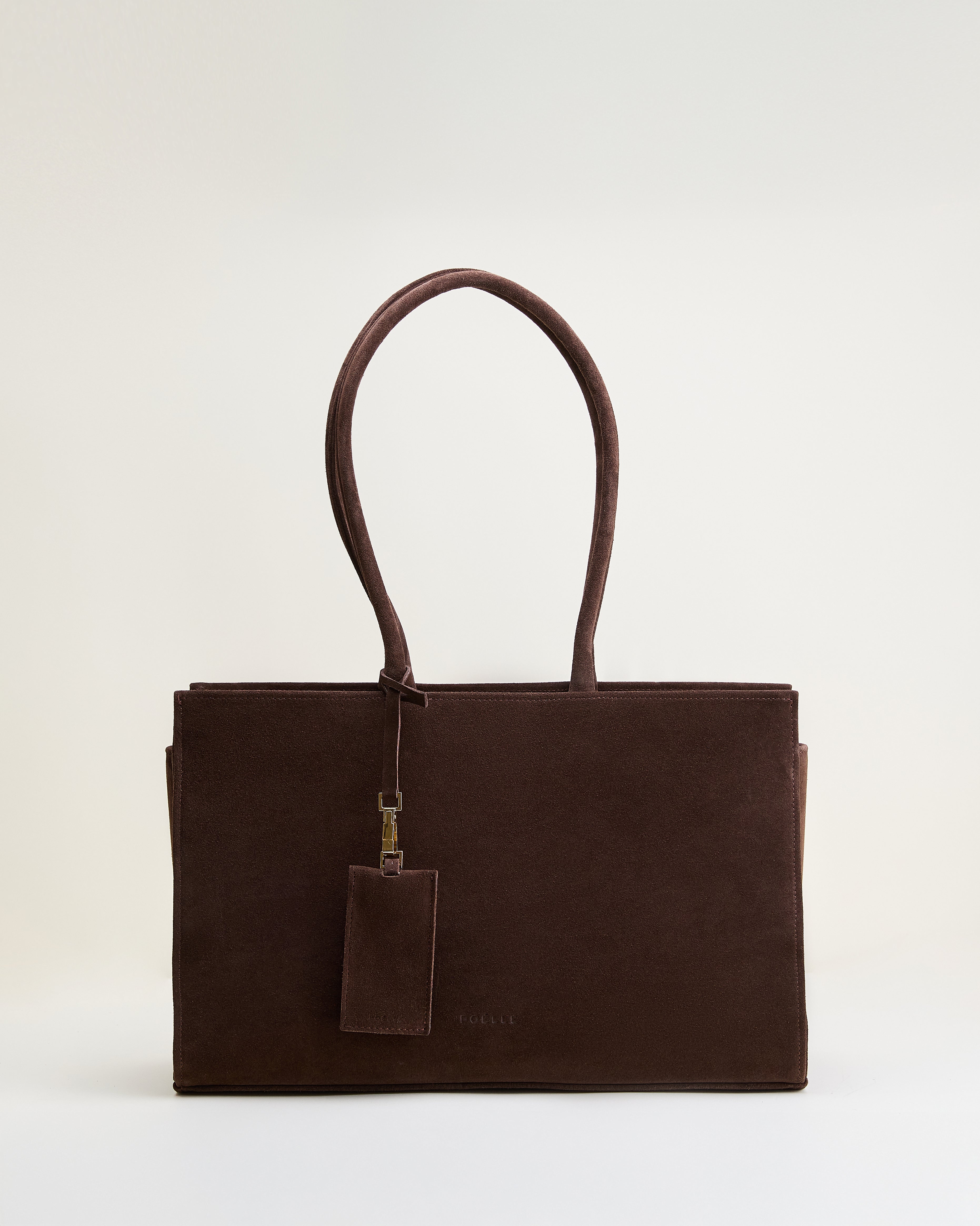 Poelle Atelier luxury suede tote bag in dark brown with long handles and minimalist design