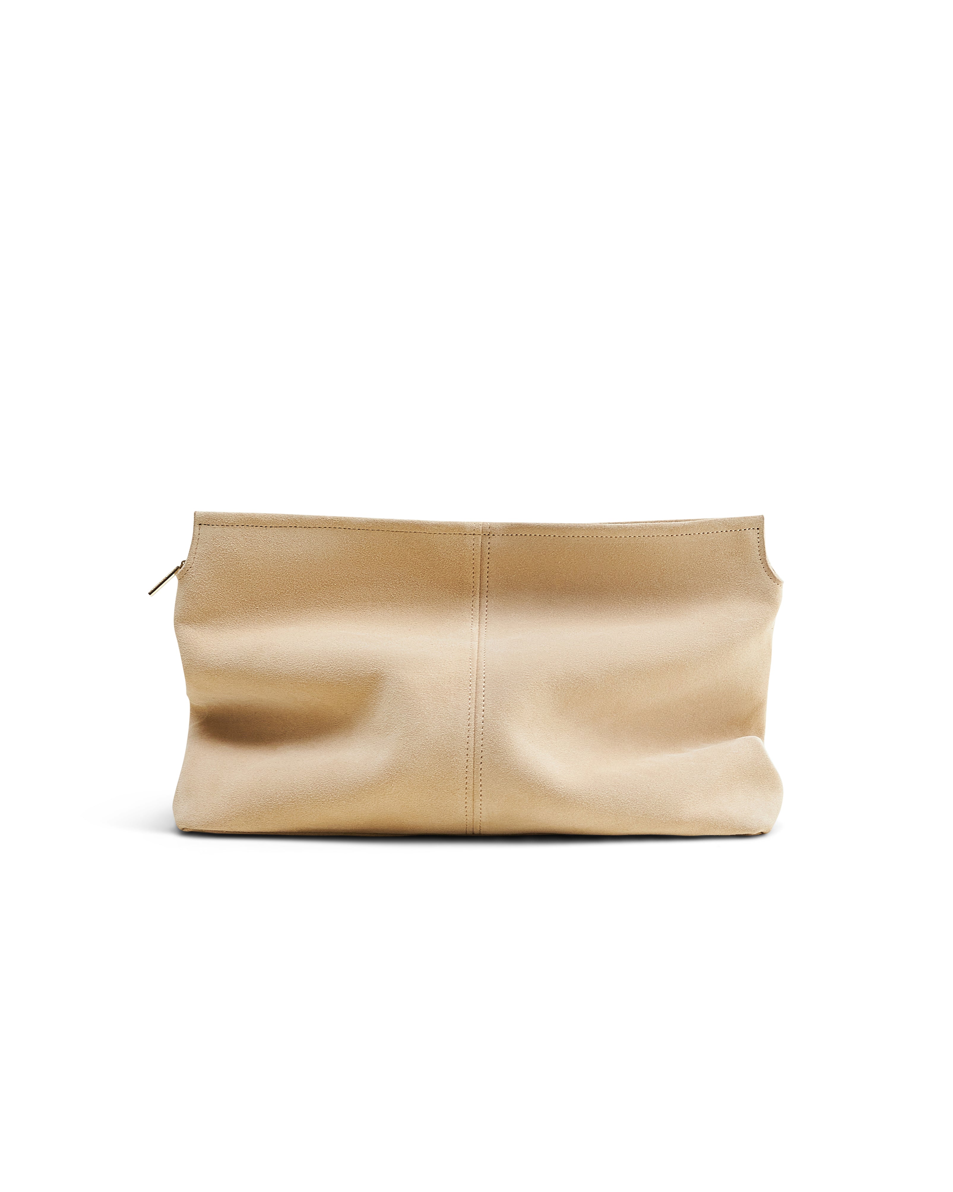 Beige luxury suede clutch bag by Poelle Atelier with a minimalist design and zipper closure