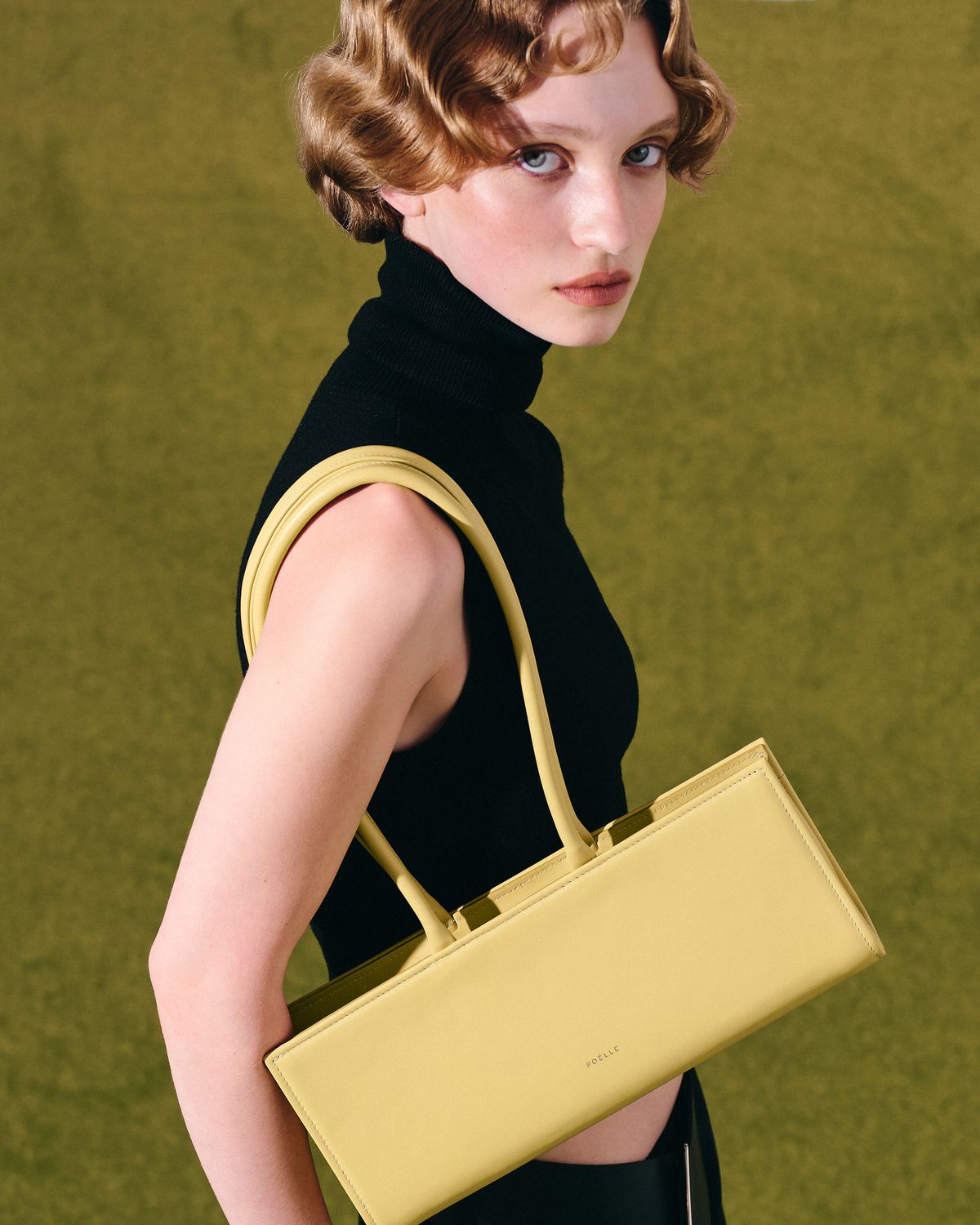Yellow Poelle bag on the shoulder, L'Art de Vivre campaign