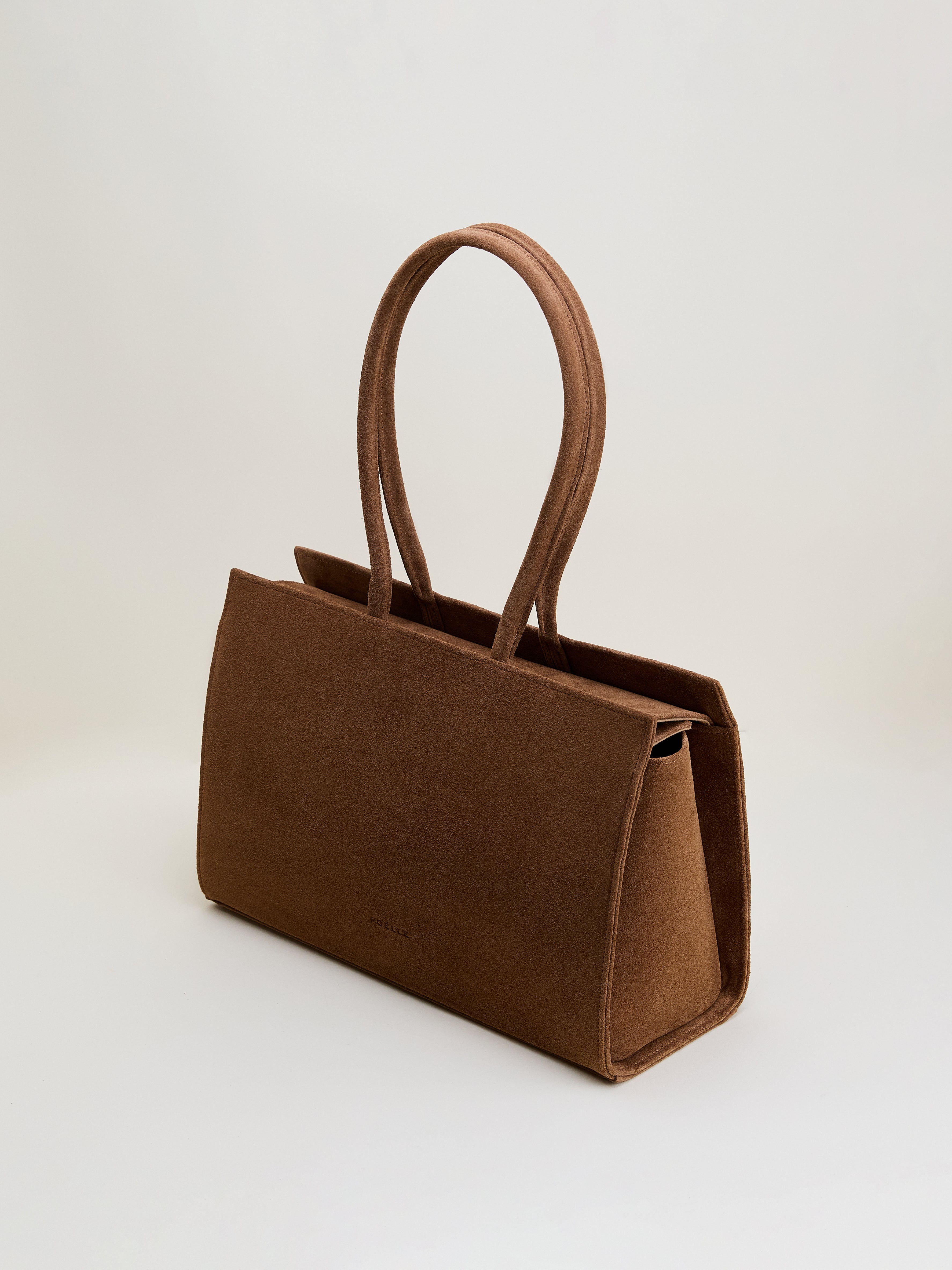 Poelle Atelier luxury suede tote bag in brown with double handles and structured design