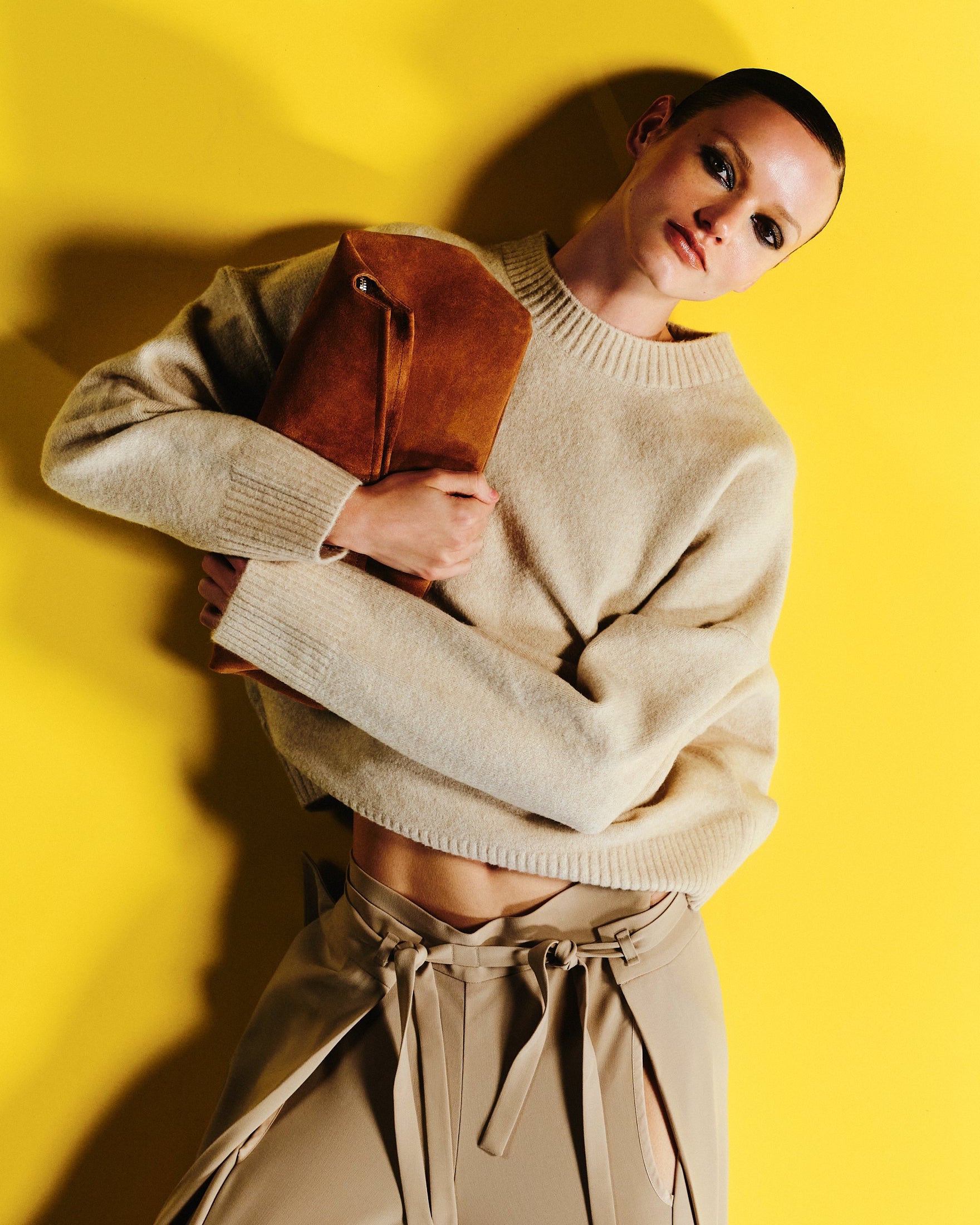 Poelle's caramel suede Elza clutch