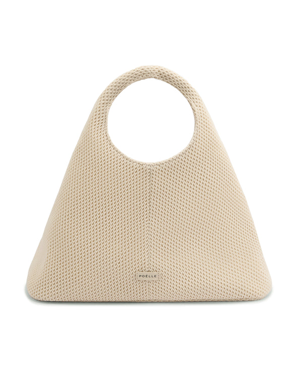 Poelle Atelier luxury minimalist summer bag in beige mesh with round handles and sleek design